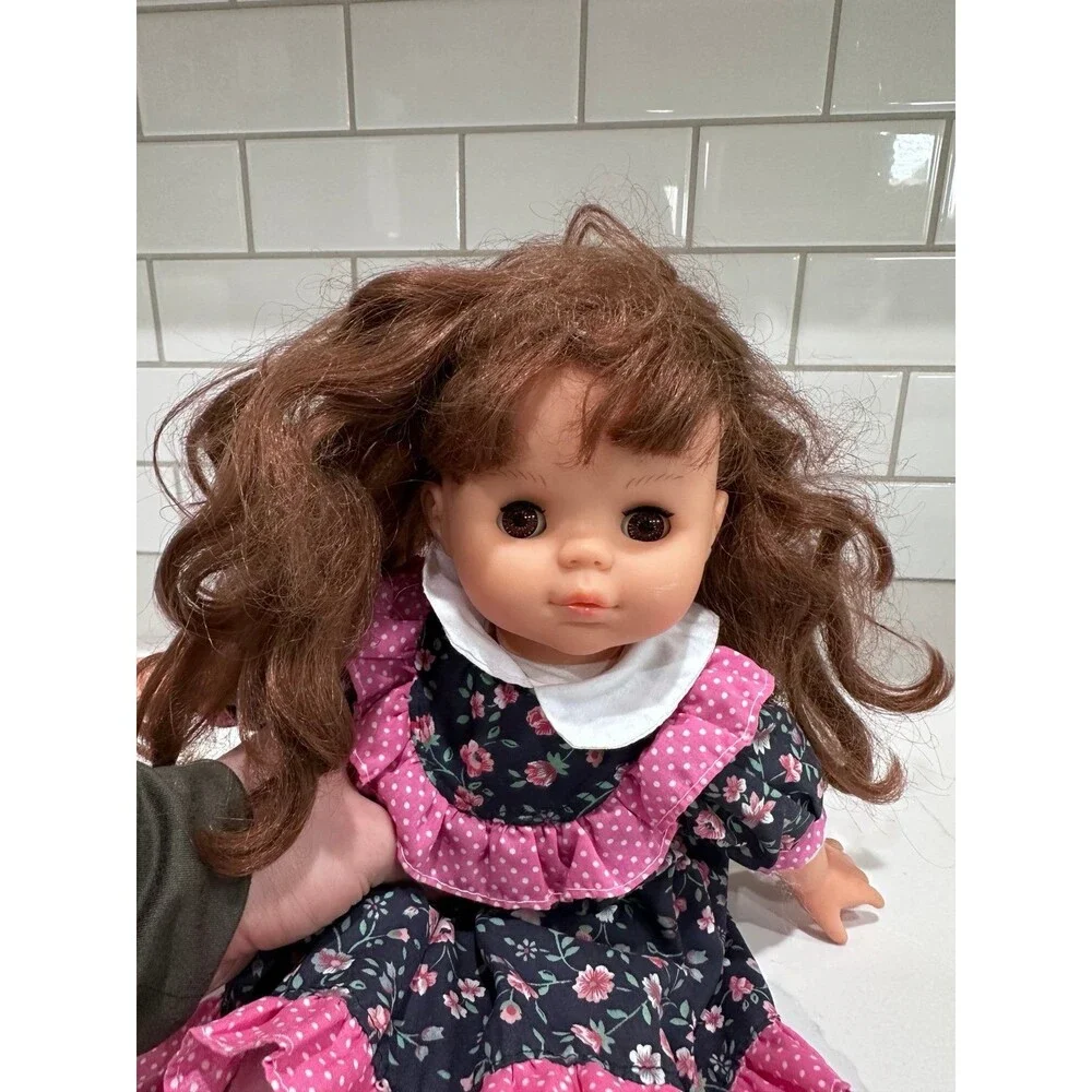 Vintage Brunette Girl Doll Floral Dress Brown Eyes Soft Body Collectible Toy